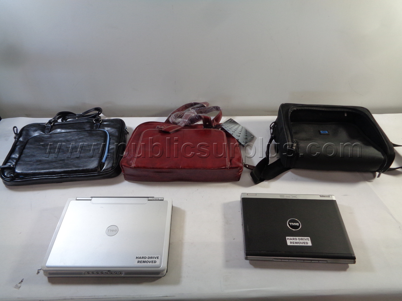 2- Laptops w/ Carrying Cases — photo 1