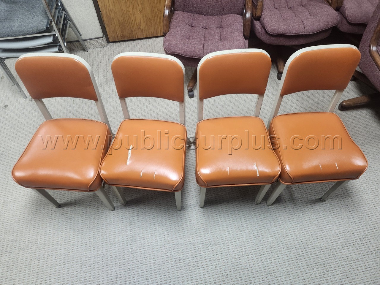 1 lot of 4 orange vinyl chairs — photo 1