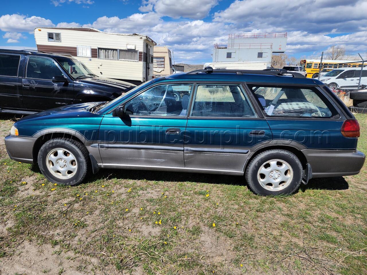 1997 Green Subaru Legacy Outback — photo 1