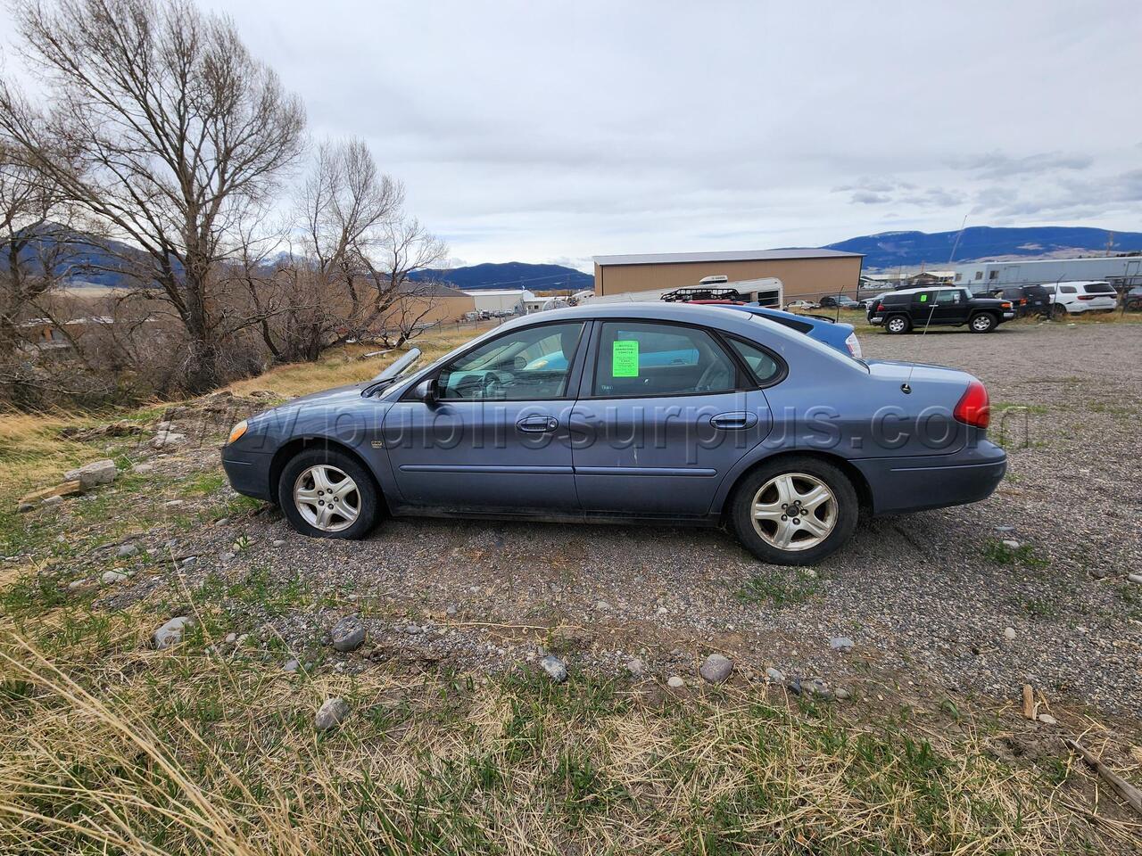 2000 Blue Ford Taurus — photo 1