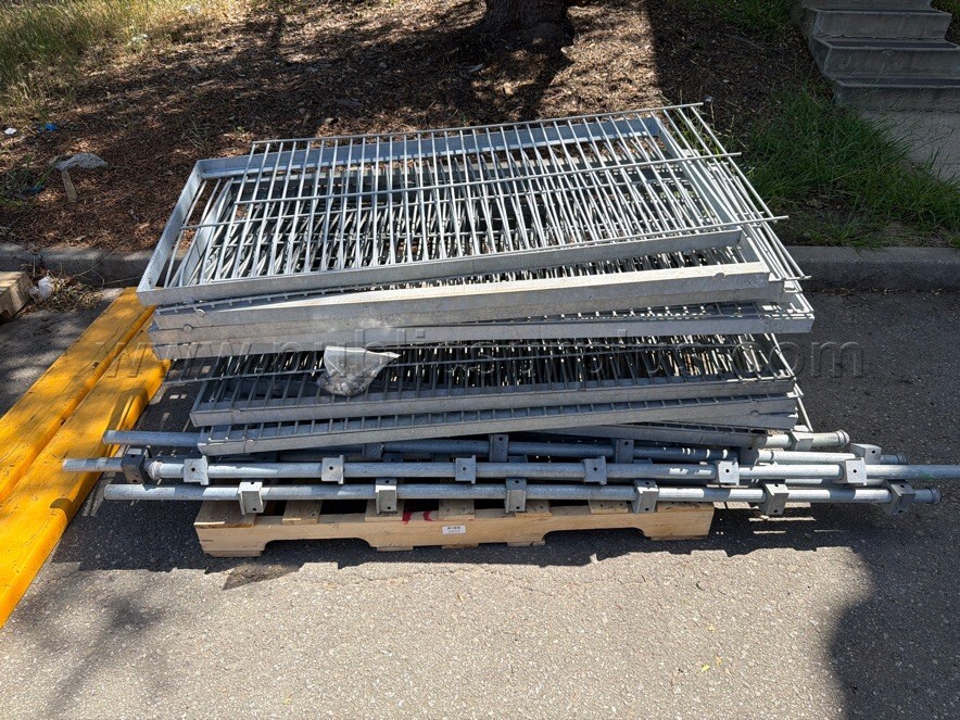 Disassembled Galvanized Aluminum Shelving Racks — photo 1