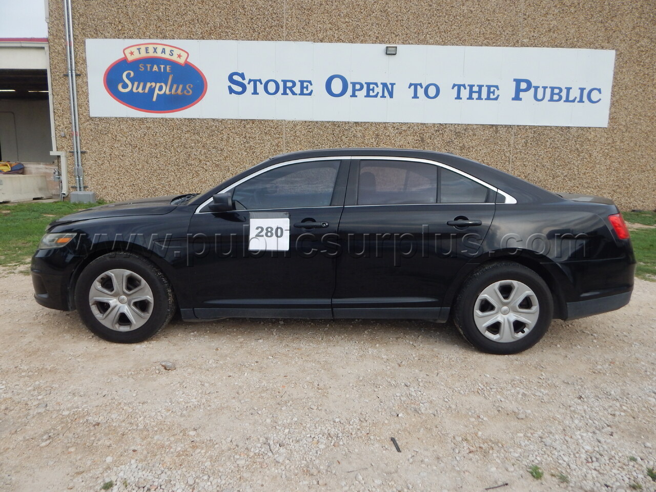 Lot 280 - 2015 Ford Taurus - 1FAHP2MK4FG173189 — photo 1