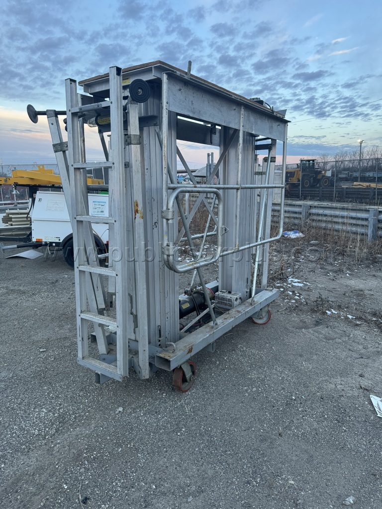 GENIE DUAL PERSONNEL LIFT (USED) — photo 1