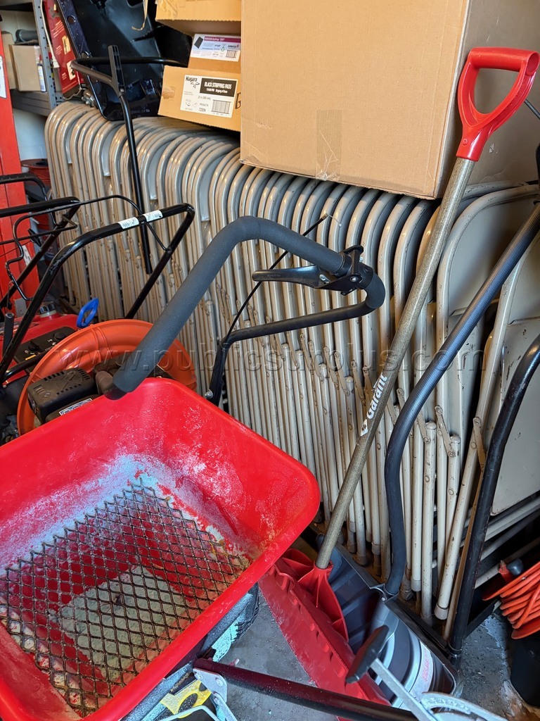 Metal folding chairs, 54 on cart.  Must purchase all chairs and carts. — photo 1