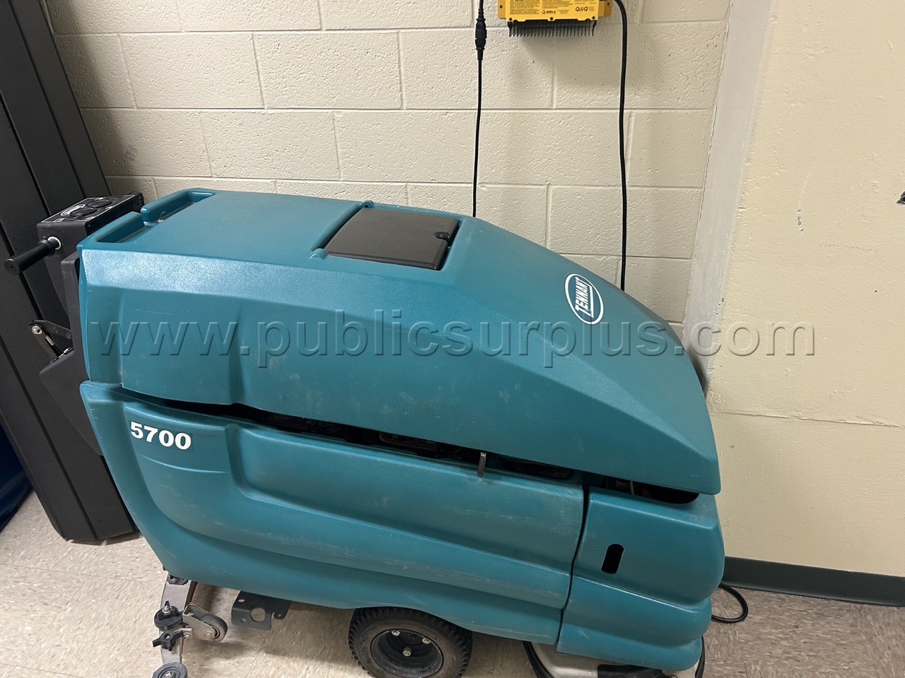 (1) Tennant M5700 Floor Scrubber — photo 1