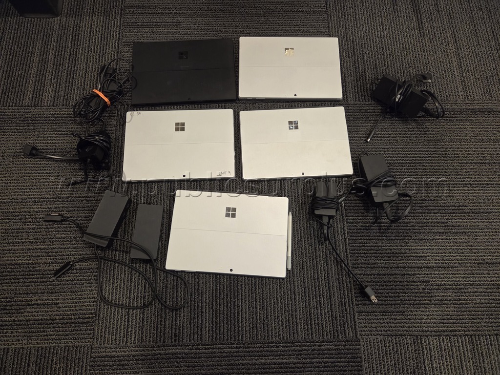 (5) Microsoft Surface Pro 7's and related cords — photo 1