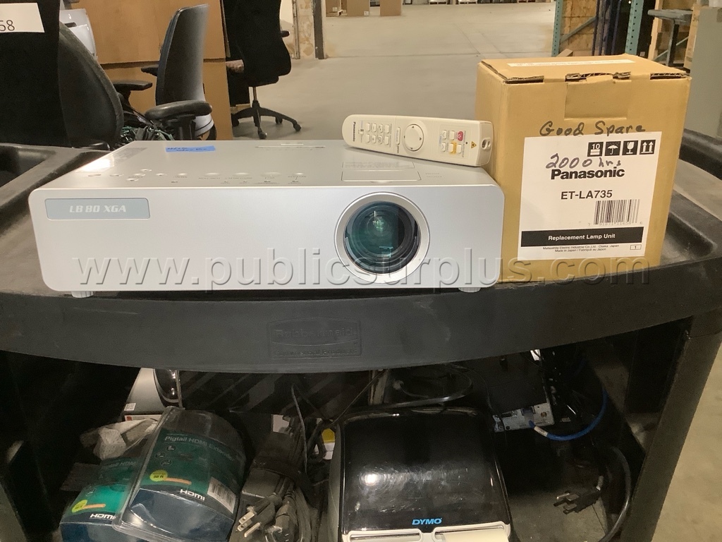 7866 - Panasonic Projector w/Remote & Spare Bulb — photo 1