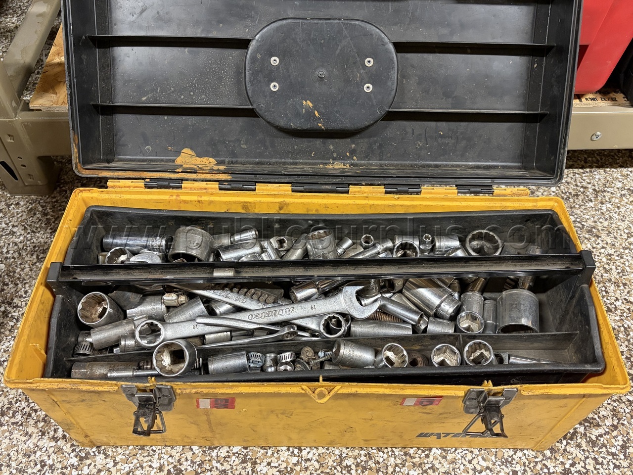 yellow tool box full of tools — photo 1