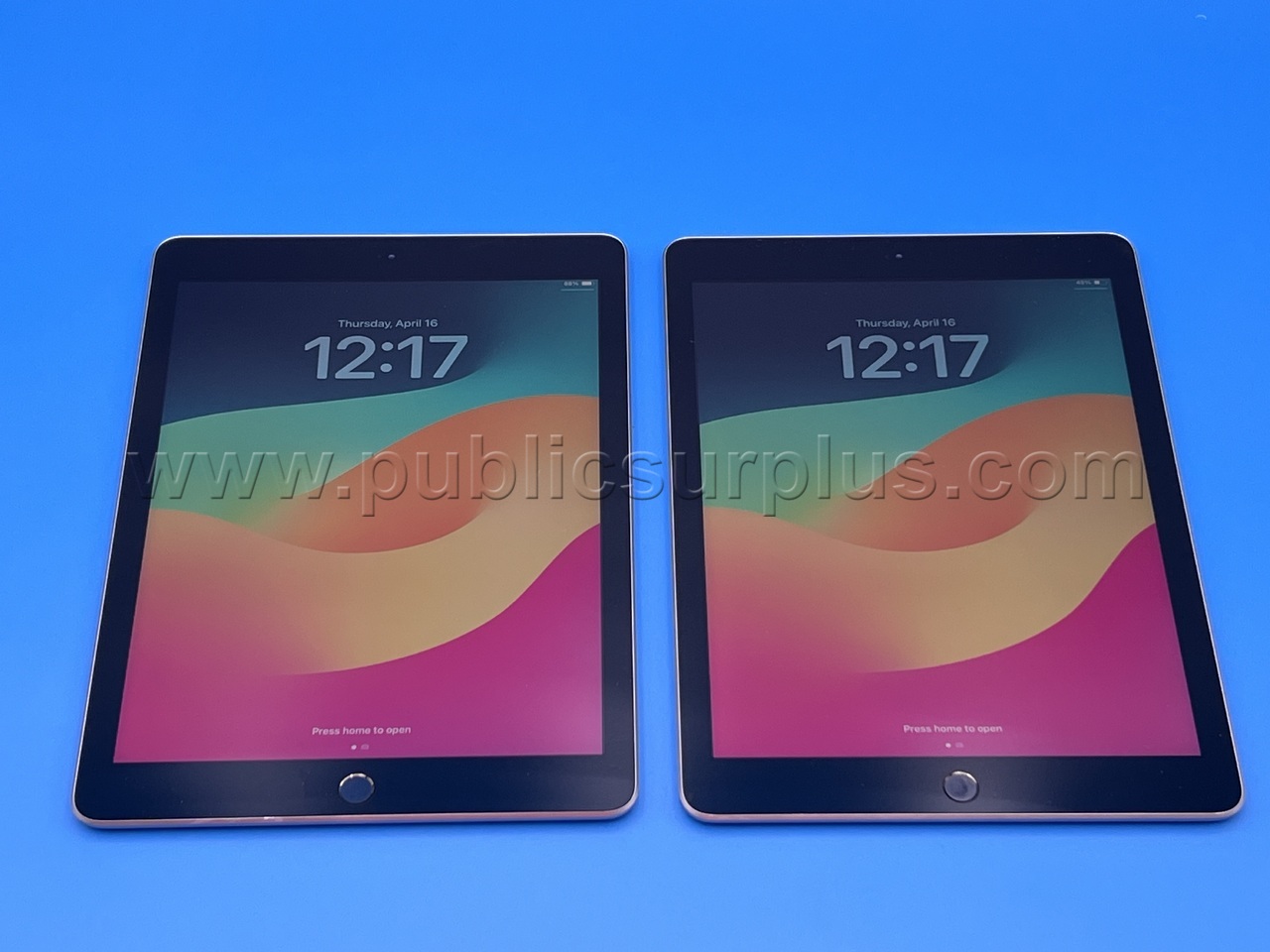 2 Apple iPads  - Shipping $20.00 /RA — photo 1