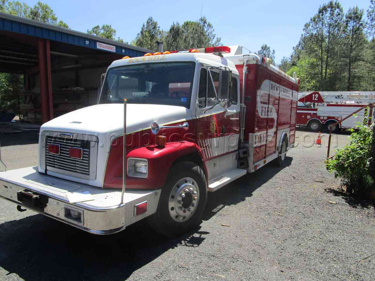 1999 FREIGHTLINER FL70 HACKNEY — photo 1