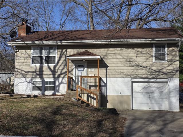 HUD Home — 13420 Belmeade Ave, Grandview, MO 64030 — photo 1