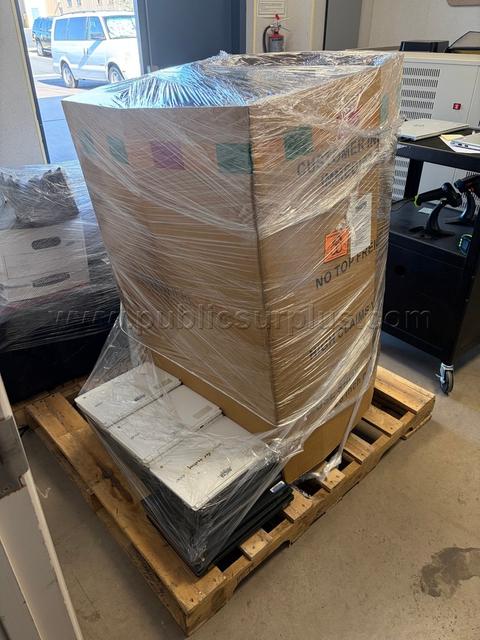 Electronics pallet featuring monitors and chrome books