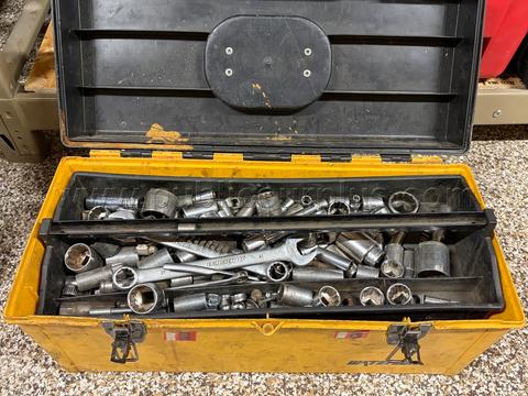 yellow tool box full of tools